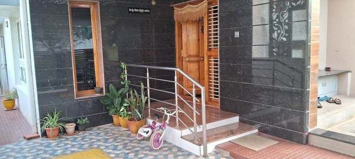 Entrance porch with stone cladding