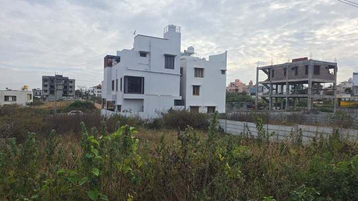 Plotted layout – house amid ongoing development