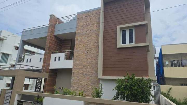 Completed independent house – stone & wood facade
